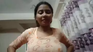 Attractive Indian takes off dress even though the boyfriend films her