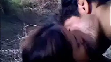 A desi husband fucks his wife outdoors in a bushes